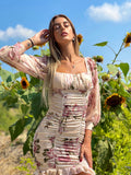 Abito arricciato con fiori rosa