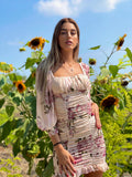Abito arricciato con fiori rosa