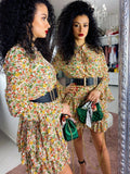 Abito a balze con fiori base bianca