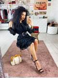 Abito a balze nero con glitter argento