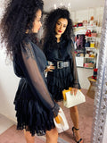 Abito a balze nero con glitter argento