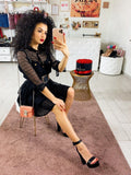 Abito in pizzo con bottoni oro