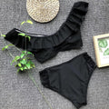 Bikini scollo a barchetta con trasparenze a pois