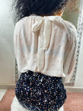 Blusa con stelline