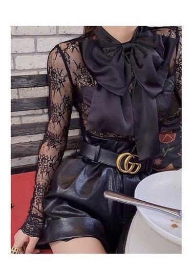 Blusa in pizzo con maxi fiocco