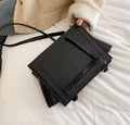 Borsa con tracolla effetto croco