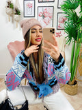 Cardigan corto frange e cinta base celeste