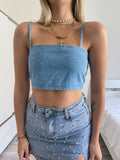 Top in jeans con strass