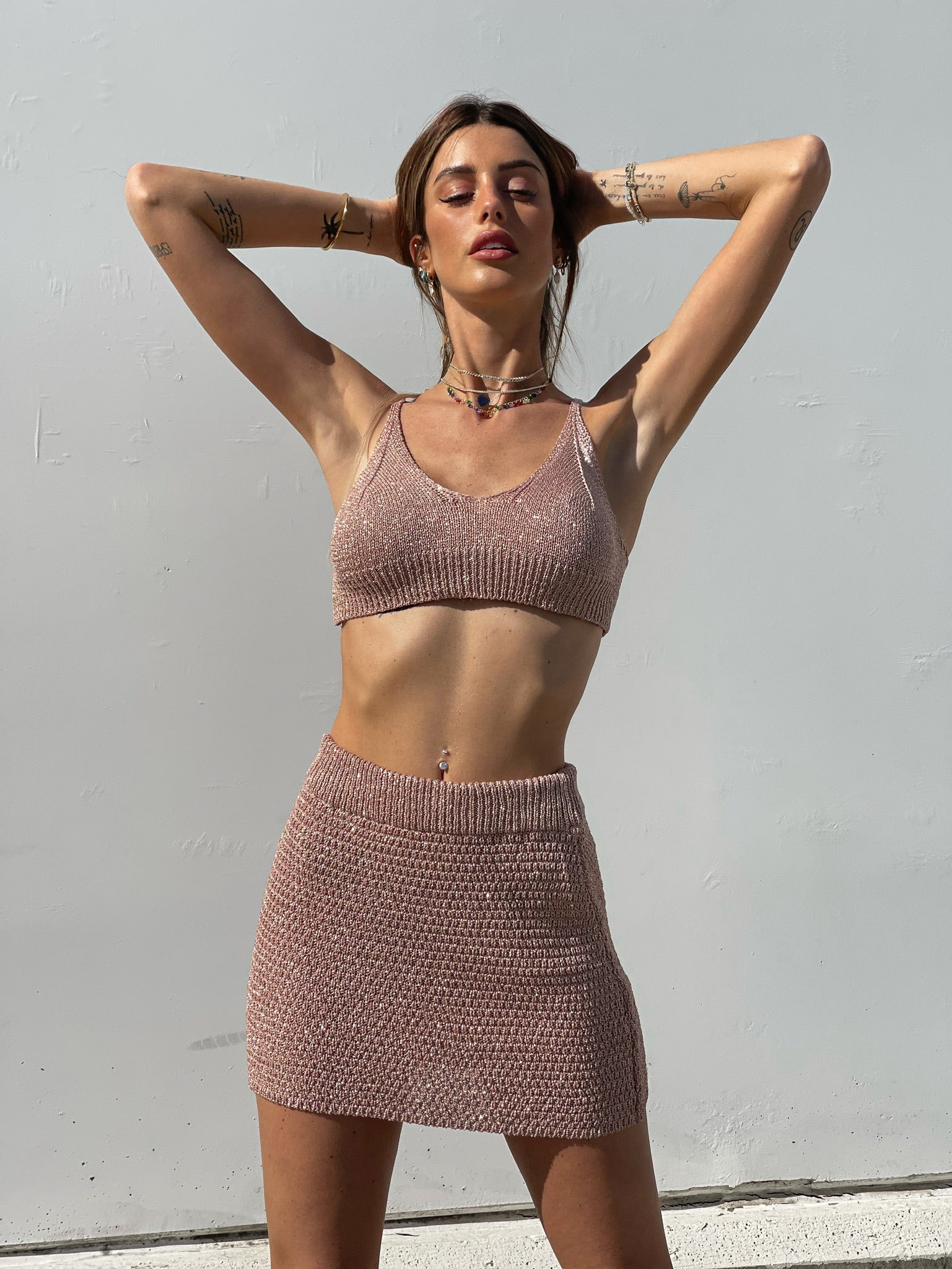 Completo top e gonna corta rosa gold