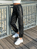 Pantalone in ecopelle con catenina nero