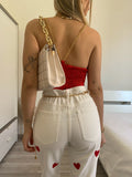 Jeans bianco cuori rossi