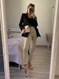 Giacca con piume nere