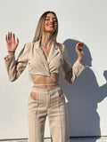 Completo top e pantalone beige