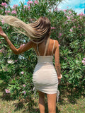 Abito aderente con arricciature beige