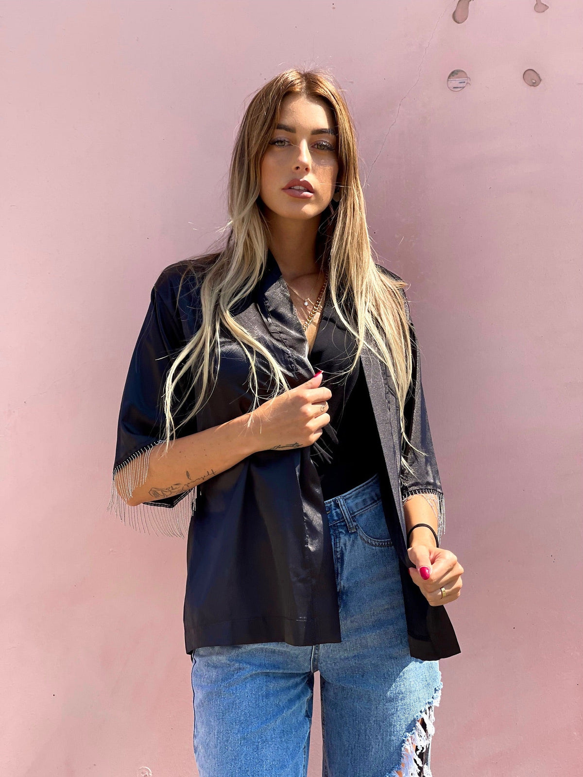 Blusa o kimono con frange