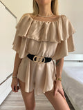 Tutina beige scollo a barchetta e balze