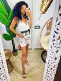 Tutina con pantaloncino a fiori rosa