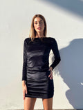 Abito in velluto schiena aperta con strass nero