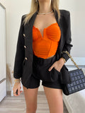 Completo giacca con bottoni e short nero