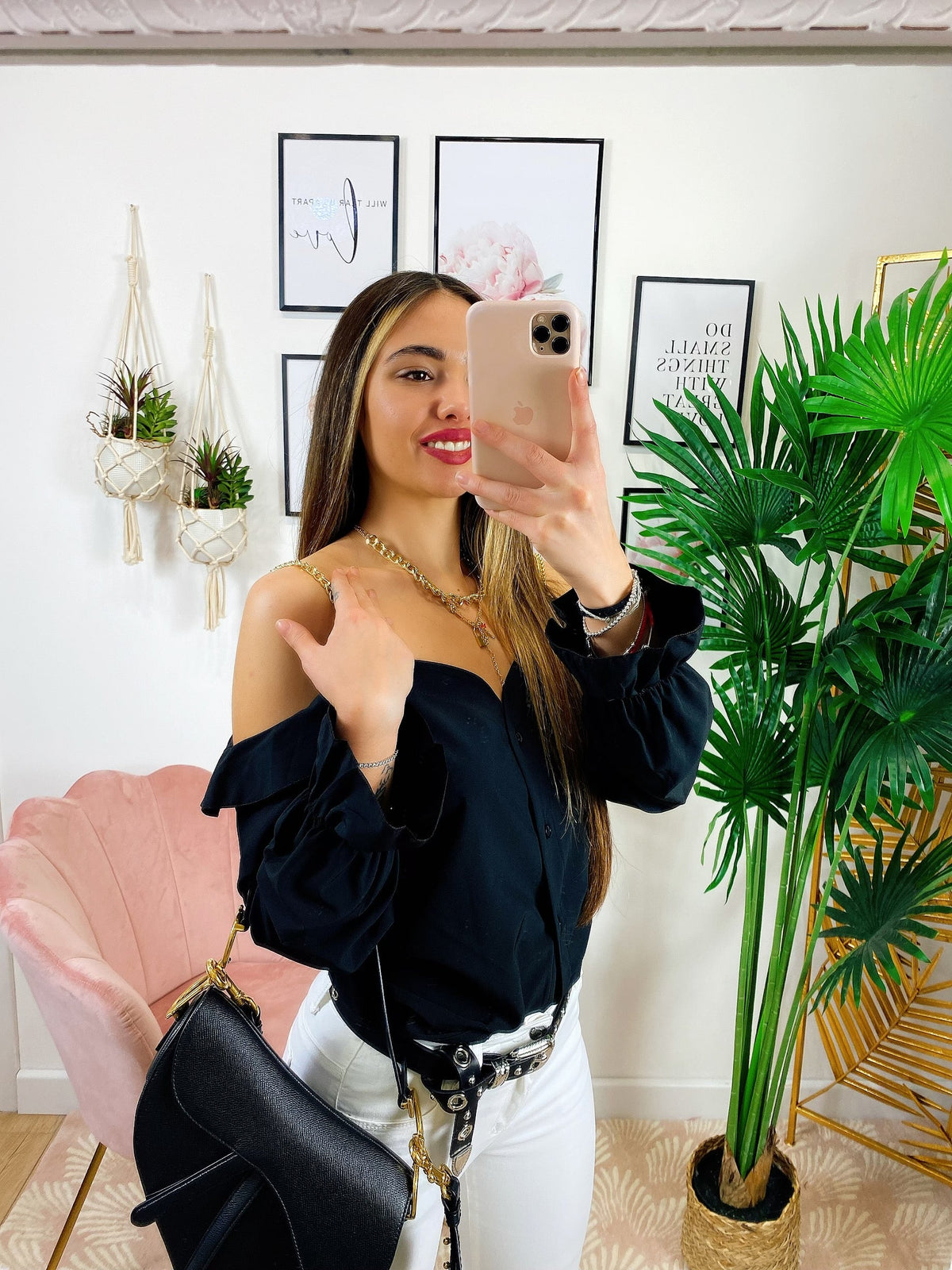 Blusa con catene scollo a barchetta