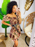 Abito a fiori nature con scollo a barchetta