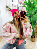 Cardigan maculato rosa con gioiello