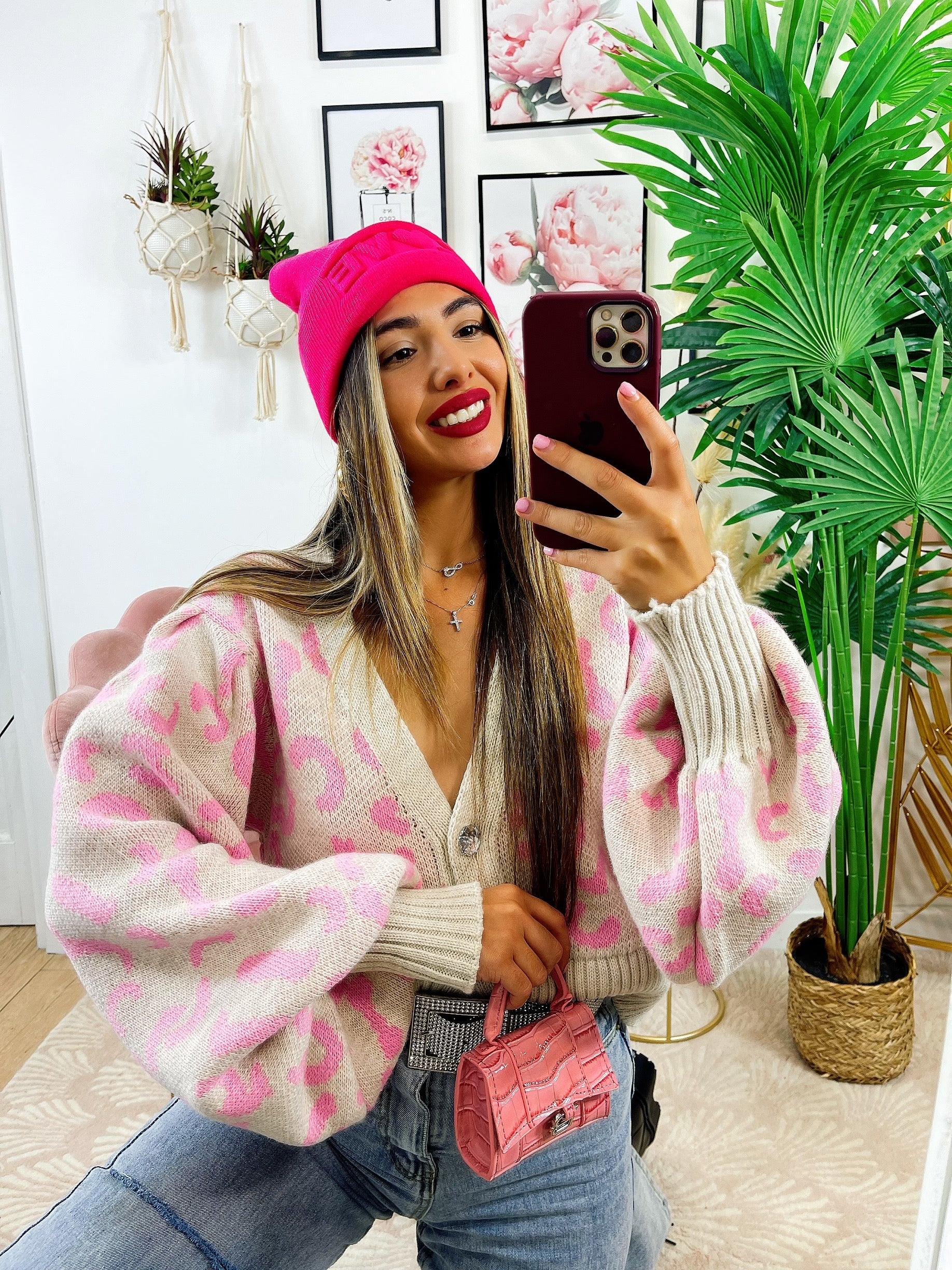 Cardigan maculato rosa con gioiello
