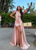 Abito rosa con fiocco e maxi gonna