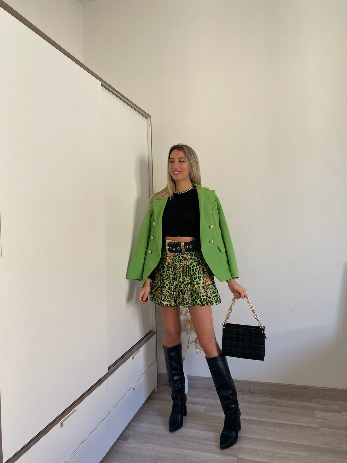 Giacca verde con bottoni oro