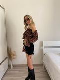 Top animalier scollo a barchetta