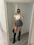 Top crop bianco con bottoncini