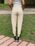 Tuta sportiva beige