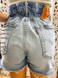 Short Vintage Levi’s jeans medio chiaro con borchie argento