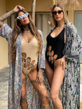 Kimono etnico dettagli oro