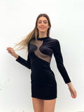 Abito nero con trasparenze
