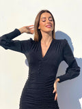 Abito glitter nero con bottoncini