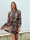 Abito in velluto nero beige