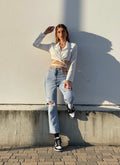 Jeans con catena argento