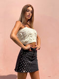 Cardigan panna a trecce