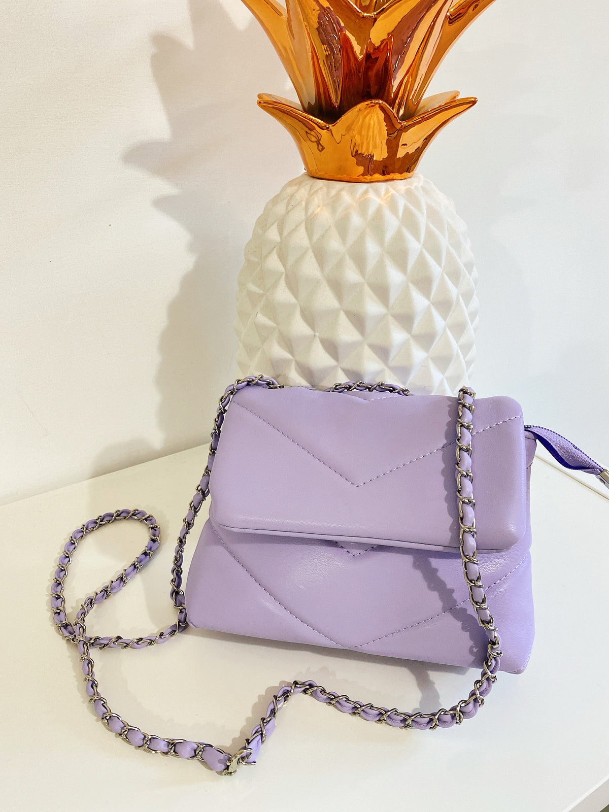 Pochette a mano con catena