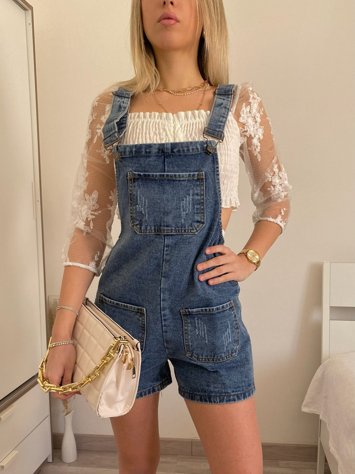 Salopette con bretelle regolabili e pantaloncino