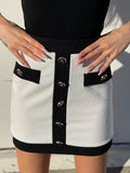 Gonna in tweed bianca con bottoni