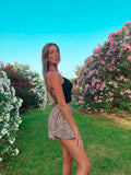 Top nero con incroci