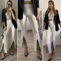 Pantaloni a zampa con strass bianco