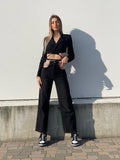 Jeans nero con doppia catena argento