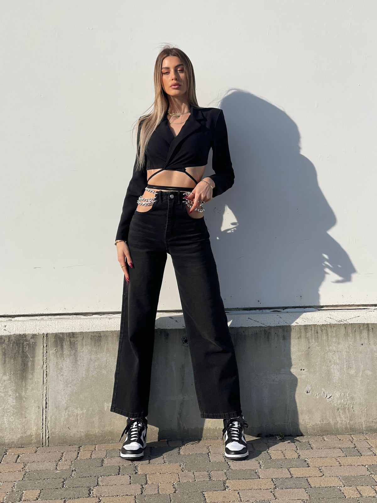Jeans nero con doppia catena argento