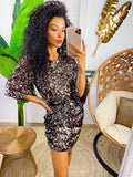 Abito con paillettes bronzo schiena aperta