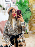 Cardigan maculato con frange e cinta