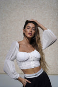 Top bianco in velo con ganci