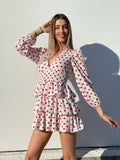 Abito bianco a balze con cuori rossi